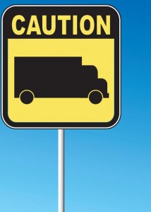 caution truck accident sign
