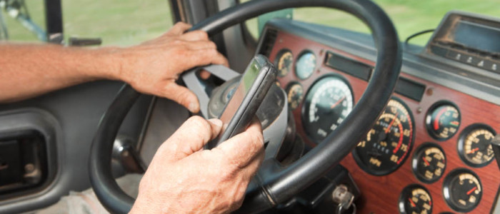 cell phone usage by truckers while driving is illegal