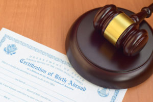 Birth Injury Attorney Orlando, FL - Justice mallet and United States Certificate of Birth Abroad
