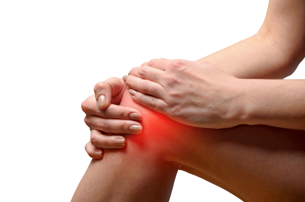 Understanding PRP Injections - Young woman having knee pain